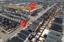Aerial view of a residential neighbourhood featuring numerous detached properties with sloped roofs and paved streets - 22931 96 Avenue, Edmonton, AB  - Outdoor With View 