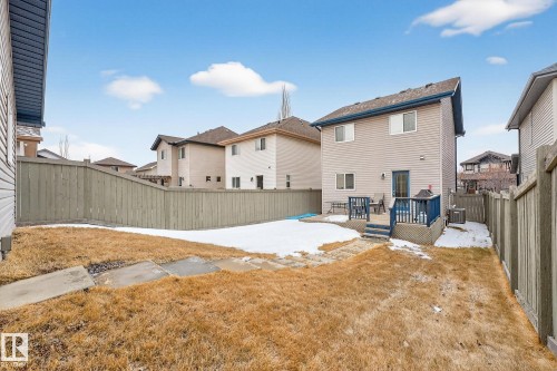 The property features a fenced yard with a deck and a patio area - 219 60 Street, Edmonton, AB - Outdoor With Exterior