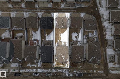 Aerial view of the property, showcasing its rectangular lot shape and its location within a residential neighborhood - 219 60 Street, Edmonton, AB -  Photo Showing Other Room