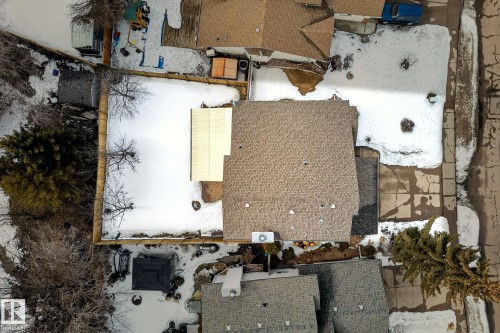 Aerial view of the property showing the roof, yard, and surrounding area - 12815 156 Avenue, Edmonton, AB - Outdoor