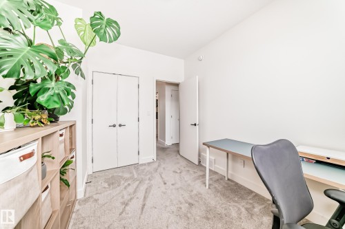 This room features light-colored walls and plush carpeting - 10936 117 Street, Edmonton, AB - Indoor Photo Showing Office