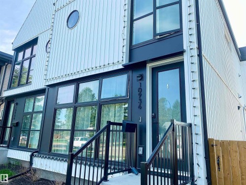 Modern exterior featuring white corrugated metal siding - 10936 117 Street, Edmonton, AB - Outdoor