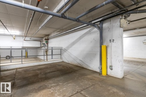 307 8730 82 Avenue, Edmonton, AB - Indoor Photo Showing Garage