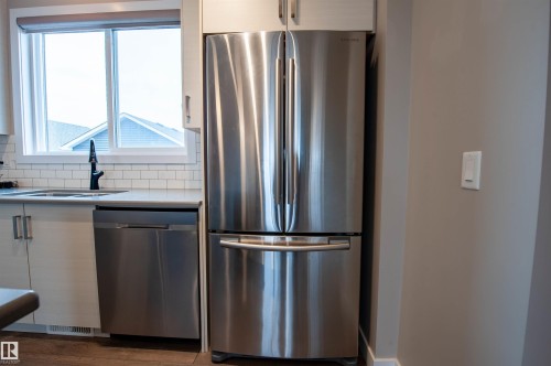 2327 84 Street, Edmonton, AB - Indoor Photo Showing Kitchen With Double Sink