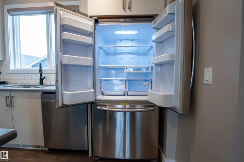 2327 84 Street, Edmonton, AB - Indoor Photo Showing Kitchen With Double Sink