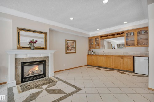 615 Twin Brooks Bend, Edmonton, AB - Indoor Photo Showing Living Room With Fireplace