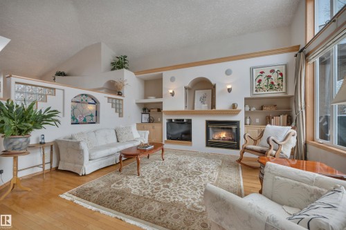 615 Twin Brooks Bend, Edmonton, AB - Indoor Photo Showing Living Room With Fireplace
