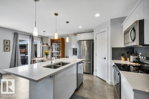 6485 King Wynd, Edmonton, AB - Indoor Photo Showing Kitchen With Double Sink With Upgraded Kitchen
