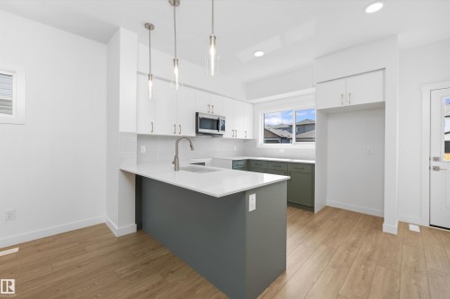 123 Sereno Lane, Fort Saskatchewan, AB - Indoor Photo Showing Kitchen With Upgraded Kitchen