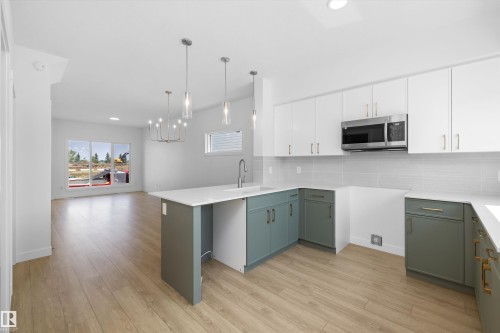123 Sereno Lane, Fort Saskatchewan, AB - Indoor Photo Showing Kitchen With Upgraded Kitchen