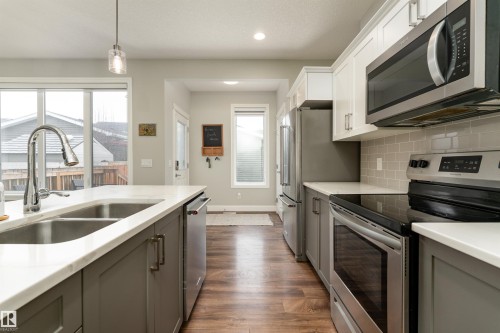 6741 Elston Lane, Edmonton, AB - Indoor Photo Showing Kitchen With Stainless Steel Kitchen With Double Sink