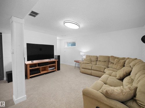 1567 37C Avenue, Edmonton, AB - Indoor Photo Showing Living Room