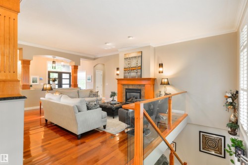 310 Caldwell Close, Edmonton, AB - Indoor Photo Showing Living Room With Fireplace