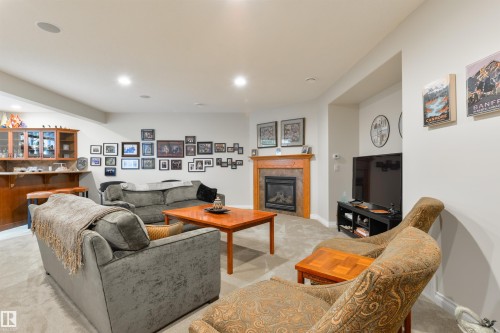 310 Caldwell Close, Edmonton, AB - Indoor Photo Showing Other Room With Fireplace
