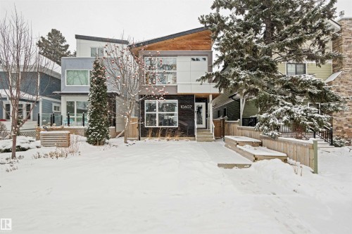 The property features modern architectural design with a sloped roofline and clean exterior finishes - 10607 127 Street, Edmonton, AB - Outdoor