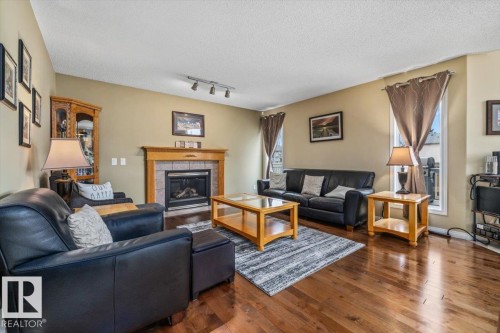 520 Wiseman Lane, Edmonton, AB - Indoor Photo Showing Living Room With Fireplace