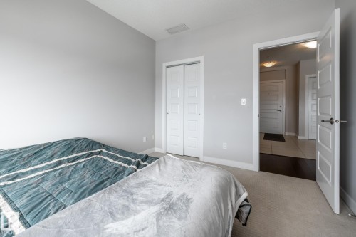 325 5151 Windermere Boulevard, Edmonton, AB - Indoor Photo Showing Bedroom