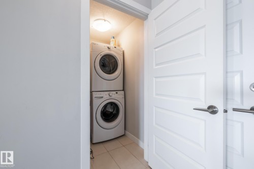325 5151 Windermere Boulevard, Edmonton, AB - Indoor Photo Showing Laundry Room