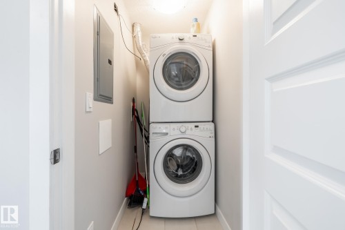 325 5151 Windermere Boulevard, Edmonton, AB - Indoor Photo Showing Laundry Room