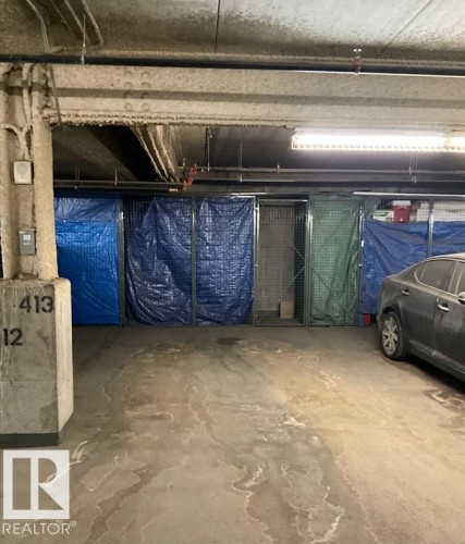 325 5151 Windermere Boulevard, Edmonton, AB - Indoor Photo Showing Garage