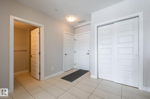 325 5151 Windermere Boulevard, Edmonton, AB - Indoor Photo Showing Other Room