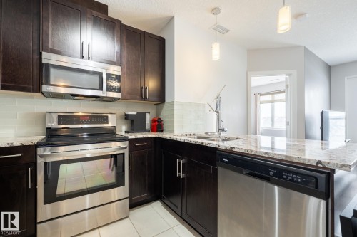 325 5151 Windermere Boulevard, Edmonton, AB - Indoor Photo Showing Kitchen With Upgraded Kitchen