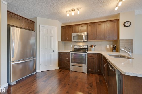 1426 152 Avenue, Edmonton, AB - Indoor Photo Showing Kitchen With Double Sink