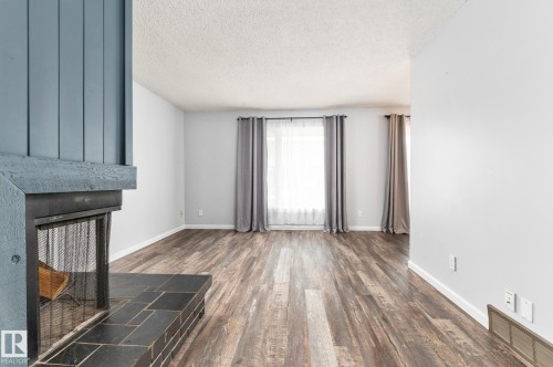 35 Wellington Crescent, Spruce Grove, AB - Indoor Photo Showing Other Room With Fireplace