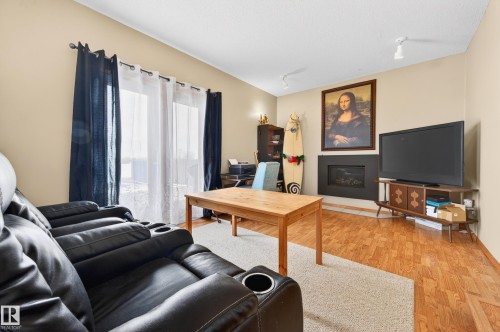 10636 110 Street, Westlock, AB - Indoor Photo Showing Living Room With Fireplace