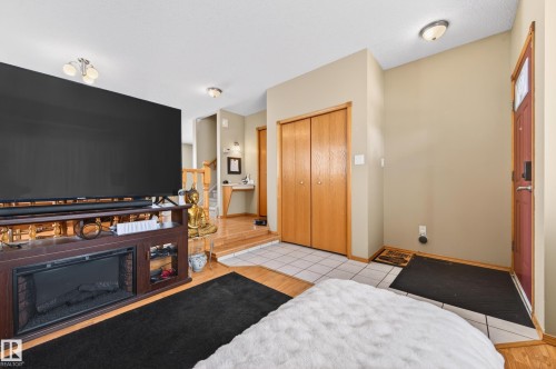 10636 110 Street, Westlock, AB - Indoor Photo Showing Bedroom With Fireplace