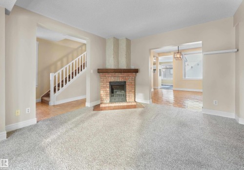 11212 75 Avenue, Edmonton, AB - Indoor Photo Showing Living Room With Fireplace