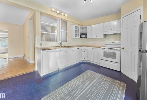 11212 75 Avenue, Edmonton, AB - Indoor Photo Showing Kitchen With Double Sink