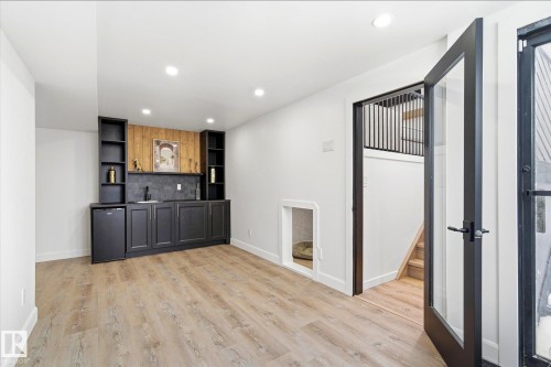 This room features light-colored flooring and white walls - 38 Woodcrest Avenue, St. Albert, AB - Indoor Photo Showing Kitchen