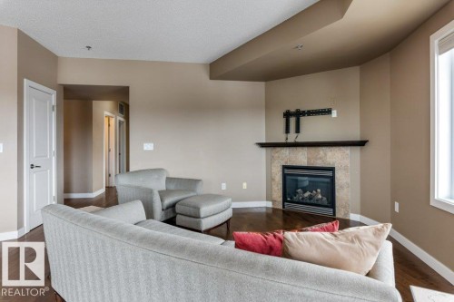 205 35 Sturgeon Road, St. Albert, AB - Indoor Photo Showing Living Room With Fireplace