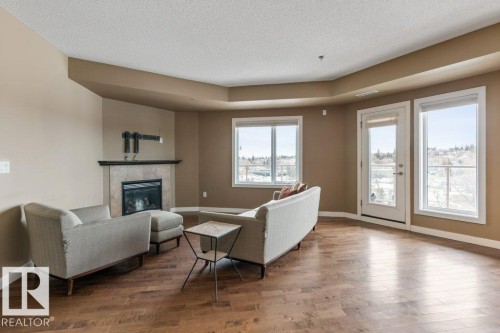 205 35 Sturgeon Road, St. Albert, AB - Indoor Photo Showing Living Room With Fireplace