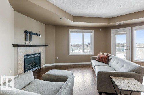 205 35 Sturgeon Road, St. Albert, AB - Indoor Photo Showing Living Room With Fireplace