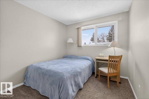 8711 22 Avenue, Edmonton, AB - Indoor Photo Showing Bedroom