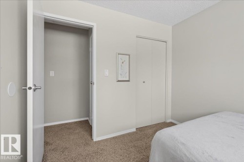 8711 22 Avenue, Edmonton, AB - Indoor Photo Showing Bedroom