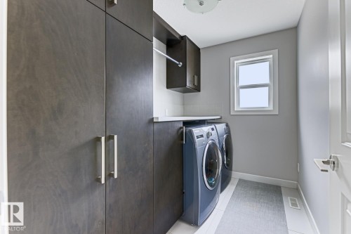 1251 Secord Landing, Edmonton, AB - Indoor Photo Showing Laundry Room