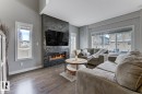1251 Secord Landing, Edmonton, AB  - Indoor Photo Showing Living Room With Fireplace 