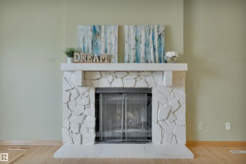 4611 41 Avenue, Beaumont, AB - Indoor Photo Showing Living Room With Fireplace