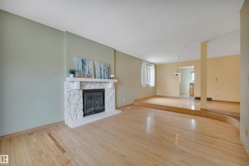 4611 41 Avenue, Beaumont, AB - Indoor Photo Showing Other Room With Fireplace
