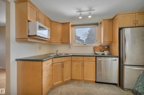 4611 41 Avenue, Beaumont, AB - Indoor Photo Showing Kitchen With Double Sink