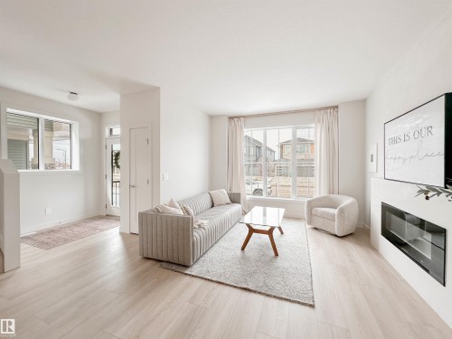 278 Jensen Lakes Boulevard, St. Albert, AB - Indoor Photo Showing Living Room With Fireplace