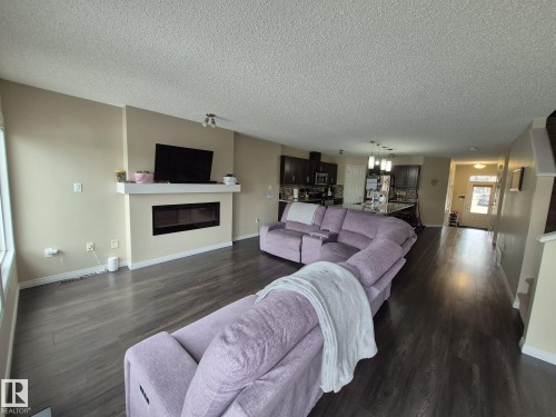 5429 Crabapple Loop, Edmonton, AB - Indoor Photo Showing Living Room With Fireplace