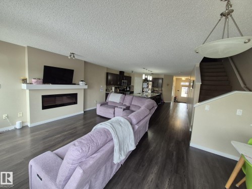 5429 Crabapple Loop, Edmonton, AB - Indoor Photo Showing Living Room With Fireplace