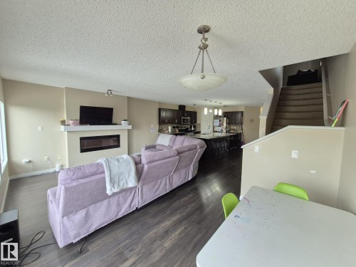 5429 Crabapple Loop, Edmonton, AB - Indoor Photo Showing Living Room With Fireplace
