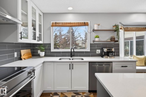 6118 37A Avenue, Edmonton, AB - Indoor Photo Showing Kitchen With Double Sink