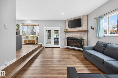 6118 37A Avenue, Edmonton, AB - Indoor Photo Showing Living Room With Fireplace