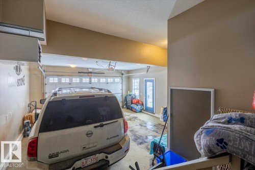 Oversized double, fully finished, heated, floor drain - 17963 78 Street, Edmonton, AB - Indoor Photo Showing Garage
